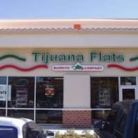 Tijuana flats st pete The oval shaped area towards the top right of the photo is the old greyhound stadium. The site is now occupied by John Blackburns Printers. The road running along the top edge of it is Old Run Road.